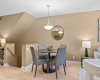 A cozy dining nook sits just off the kitchen, perfect for everyday meals or entertaining.