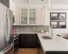 Beautiful kitchen w/ SS appliances, quartz countertops, two-tone cabinetry