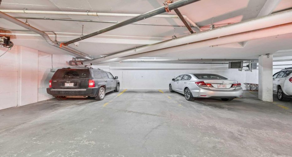 The parking stall is conveniently located close to the elevator.