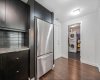 Spacious laundry and storage space neatly tucked away.