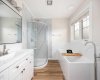 Beautiful ensuite bath with separate shower
