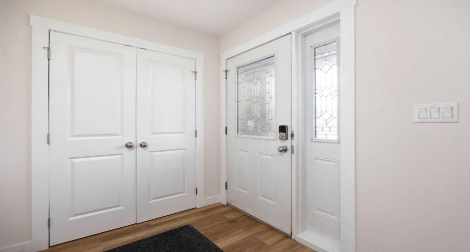 Double closet doors in entry