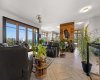 Open living with accordian doors to deck Open living with accordian doors to deck