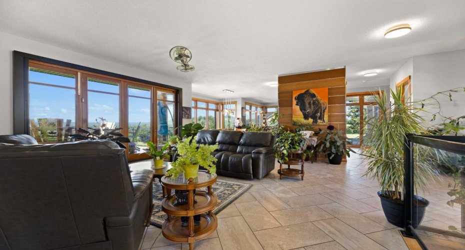 Open living with accordian doors to deck Open living with accordian doors to deck