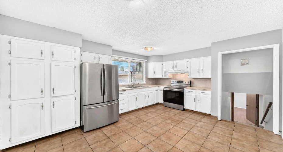 6839 Huntridge Hill, Calgary, Alberta T2K 4A1, 4 Bedroom Bedrooms, 0 ,3 BathroomBathrooms,Residential,For Sale,Huntridge,0,A2327673