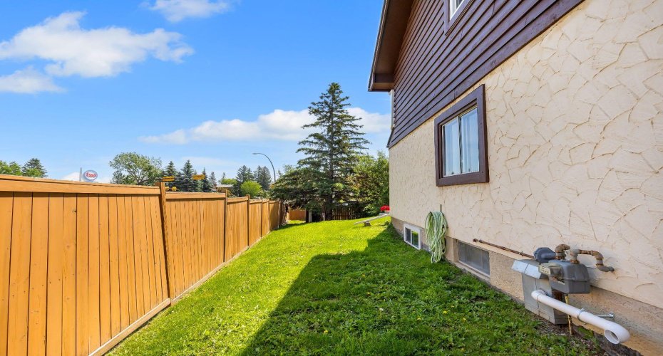 Side of Home with Access Gate