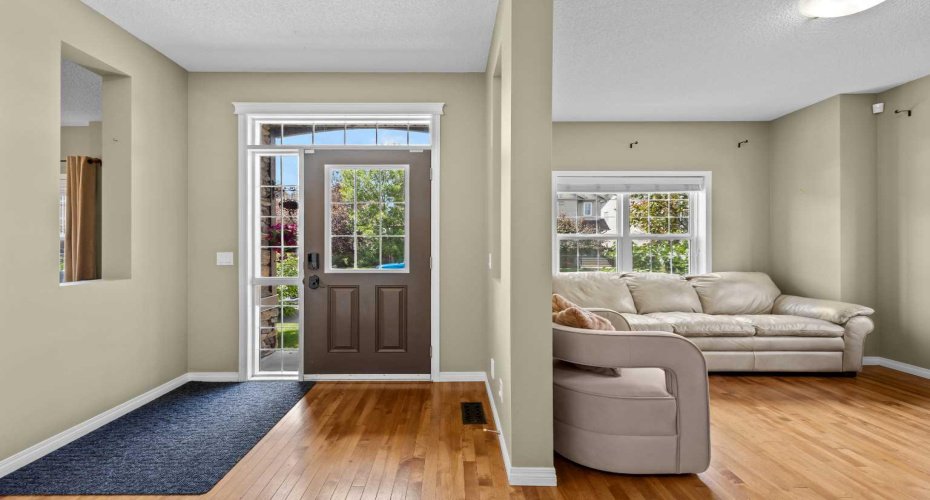 Spacious front entrance with living room to the left