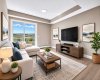 This is a staged image from a previous building showing the living room in suite 201