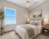 This is a staged image from a previous building showing the bedroom in suite 201