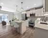 This is a staged image from a previous building showing the kitchen in suite 201