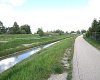 Backs to Path ,Canal, & Birchwood Park.