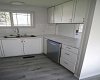 Open Counter , Lots of Upper and Lower Cabinets .