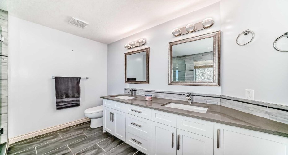 Upgraded ensuite with dual sinks, stand alone tub and oversized shower!