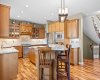 A spacious kitchen island offers plenty of prep space and casual seating, a great room for entertaining family and friends. A spacious kitchen island offers plenty of prep space and casual seating, a great room for entertaining family and friends.