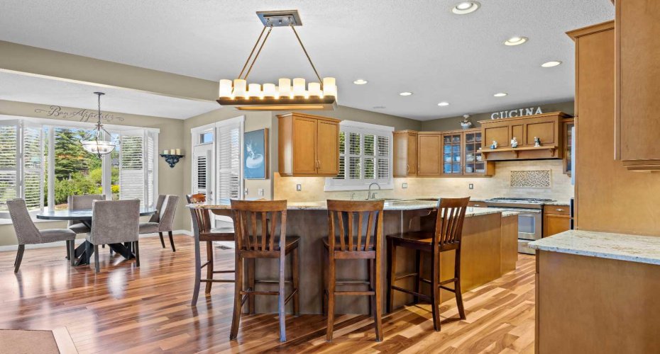 The heart of the home, this open kitchen and breakfast nook combination is made for entertaining, with a large island, ample seating and easy flow to the backyard. The heart of the home, this open kitchen and breakfast nook combination is made for entertaining, with a large island, ample seating and easy flow to the backyard.