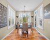 The sunny breakfast nook is the perfect spot for a morning coffee, with garden views through wraparound windows. The sunny breakfast nook is the perfect spot for a morning coffee, with garden views through wraparound windows.