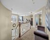 A bright upper level landing overlooks the staircase below and opens onto a versatile loft space, ideal for a home office or reading nook. A bright upper level landing overlooks the staircase below and opens onto a versatile loft space, ideal for a home office or reading nook.
