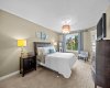 The primary retreat offers a bright, spacious layout with large windows overlooking the neighbuorhood. The primary retreat offers a bright, spacious layout with large windows overlooking the neighbuorhood.