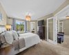 This expansive primary suite includes a private sitting area and direct access to the spa like ensuite, offering a true owner's retreat. This expansive primary suite includes a private sitting area and direct access to the spa like ensuite, offering a true owner's retreat.