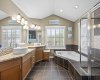 This expansive primary suite includes a private sitting area and direct access to the spa like ensuite, offering a true owner's retreat. This expansive primary suite includes a private sitting area and direct access to the spa like ensuite, offering a true owner's retreat.