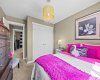 This bedroom includes a spacious double closet, ideal for a child's room or guest space. This bedroom includes a spacious double closet, ideal for a child's room or guest space.