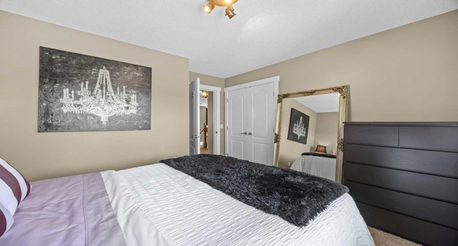 Neutral tones and a large closet make this bedroom both stylish and functional. Neutral tones and a large closet make this bedroom both stylish and functional.