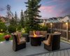 Gather around the fire table on cool evenings, a cozy focal point for the deck's lounge seating area. Gather around the fire table on cool evenings, a cozy focal point for the deck's lounge seating area.