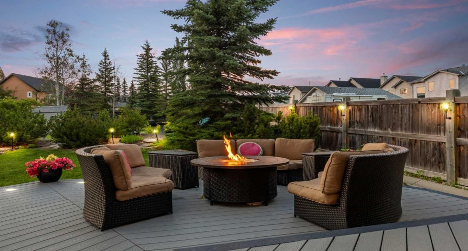 Gather around the fire table on cool evenings, a cozy focal point for the deck's lounge seating area. Gather around the fire table on cool evenings, a cozy focal point for the deck's lounge seating area.