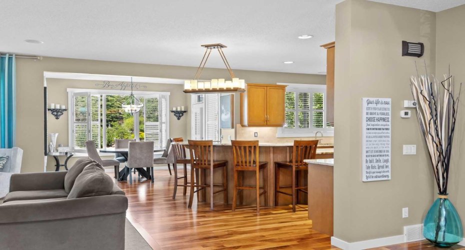 This open concept floor plan puts the kitchen at the heart of the home, with rich wood cabinetry, granite counters and stainless steel appliances flowing effortlessly into the living space. This open concept floor plan puts the kitchen at the heart of the home, with rich wood cabinetry, granite counters and stainless steel appliances flowing effortlessly into the living space.