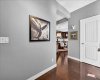 That door is to the half bath, tucked away for privacy from the living space