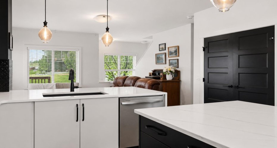 Matte black interior doors, upgraded MDF cabinetry and a timeless colour palette