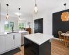 Designer lighting and modern, custom finishes throughout