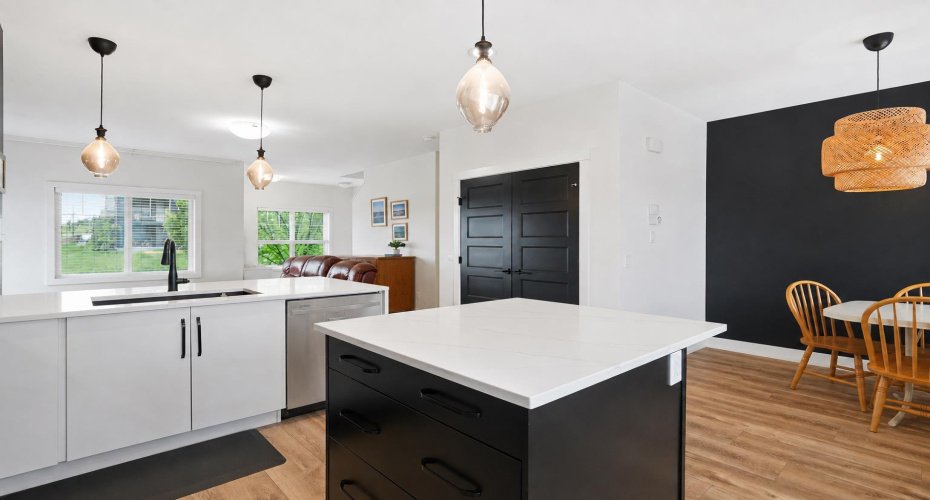 Designer lighting and modern, custom finishes throughout