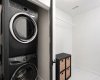 Stacked Washer/Dryer in Basement with Additional Storage Space