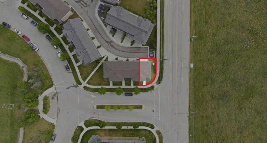 Corner End-Unit & Undeveloped Land to the West