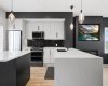Full-height cabinetry & a quartz countertop with a waterfall edge