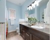 5 piece bathroom with soaker tub and shower and double vanity