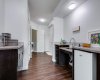 Kitchenette set up in the basement with room for a full sized fridge and dishwasher