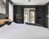 Primary Bedroom w. Private Balcony - Main