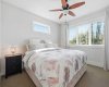 Expansive primary bedroom featuring an upgraded upper window that opens!