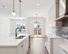 View from Kitchen to Dining Area • PLEASE NOTE: Kitchen appliances are included, and will be installed prior to possession.