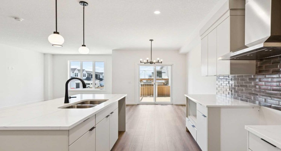 View from Kitchen to Dining Area • PLEASE NOTE: Kitchen appliances are included, and will be installed prior to possession.