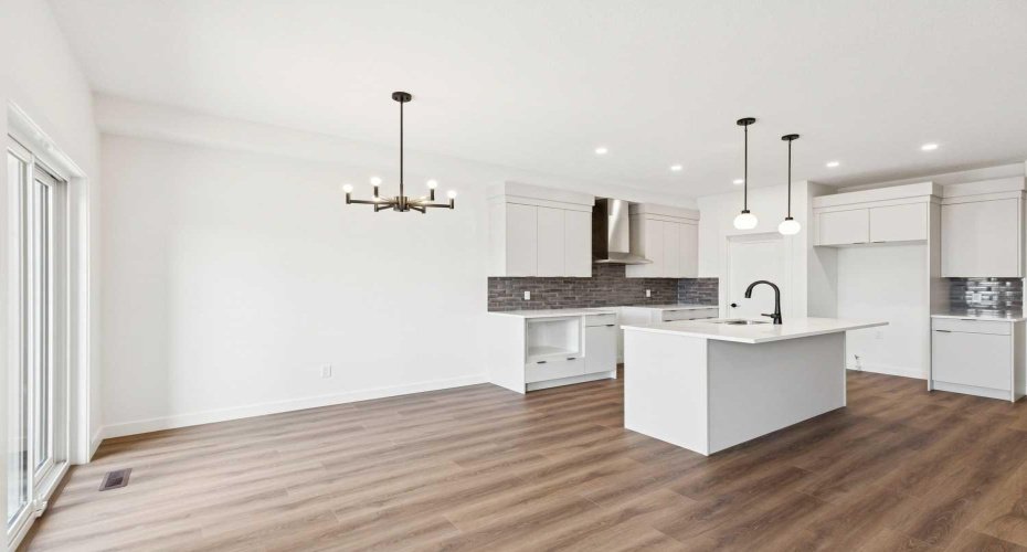 Dining Area & Kitchen • PLEASE NOTE: Kitchen appliances are included, and will be installed prior to possession.