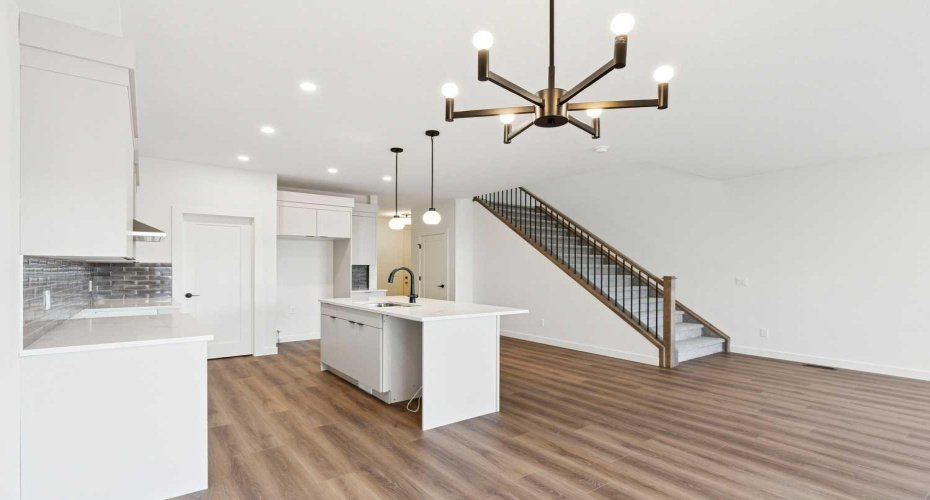 View from Dining Area to Kitchen & Stairs to Upper Floor