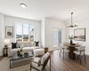 VIRTUALLY STAGED • Living Room & Dining Area