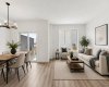 VIRTUALLY STAGED • Dining Area & Living Room
