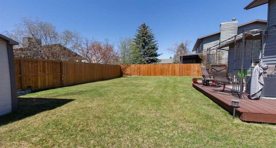303 Woodside Place, Okotoks, Alberta T1S 1L9, 5 Bedrooms Bedrooms, ,3 BathroomsBathrooms,Residential,For Sale,Woodside,A2329310