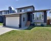 303 Woodside Place, Okotoks, Alberta T1S 1L9, 5 Bedrooms Bedrooms, ,3 BathroomsBathrooms,Residential,For Sale,Woodside,A2329310