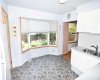 Bow Window Eating nook in the Kitchen, overlooks the backyard