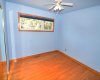 Primary Bedroom With hardwood floors